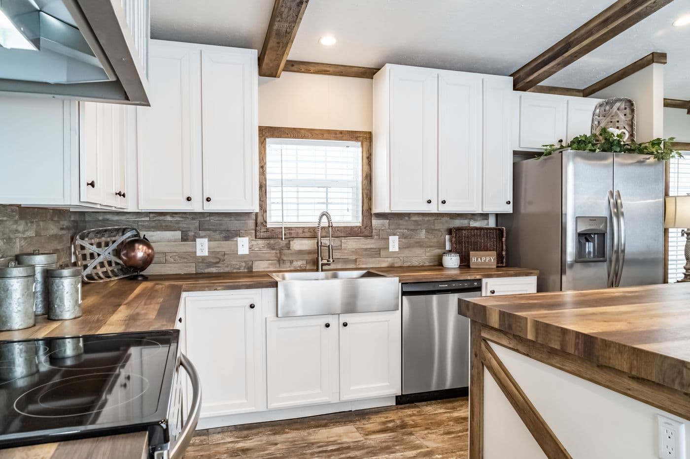 The THE BOBBY JO Kitchen. This Manufactured Mobile Home features 3 bedrooms and 2 baths.