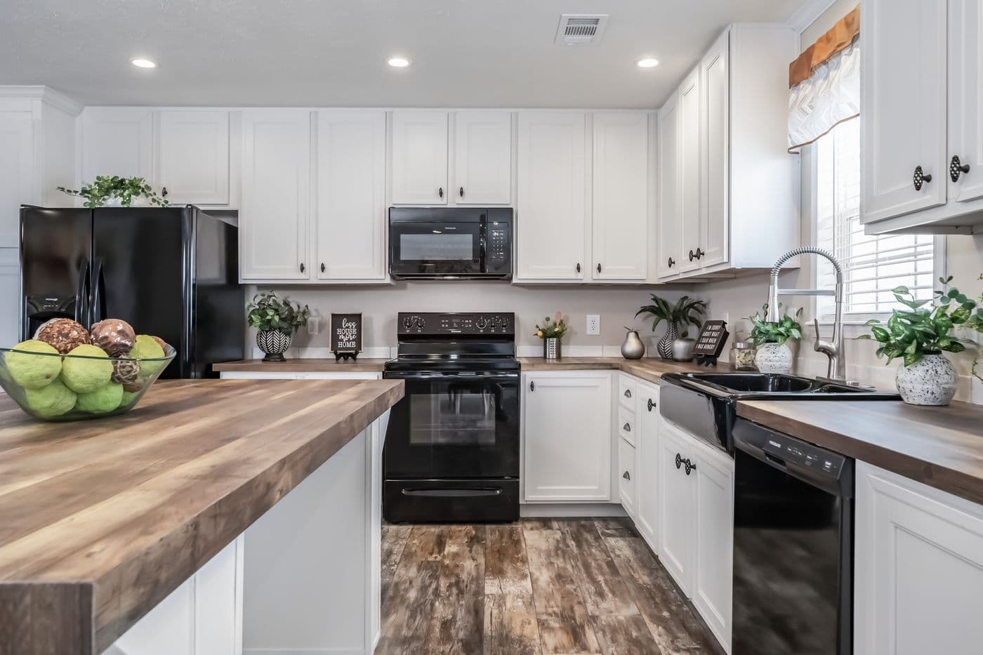 The THE JEFFERSON Kitchen. This Manufactured Mobile Home features 3 bedrooms and 3 baths.