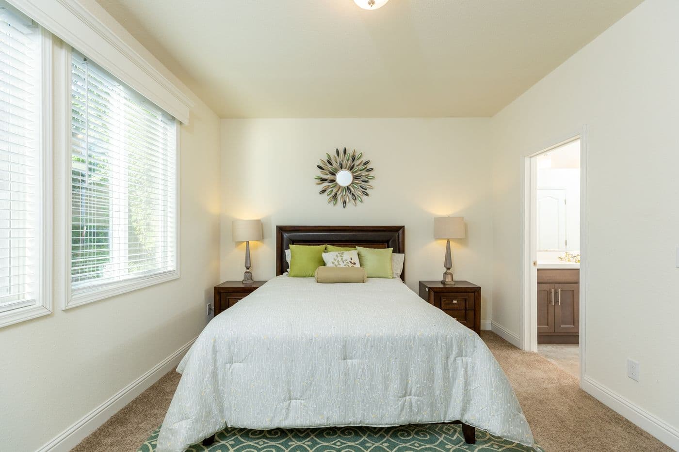 The FAIRPOINT 24623A Primary Bedroom. This Manufactured Mobile Home features 3 bedrooms and 2 baths.
