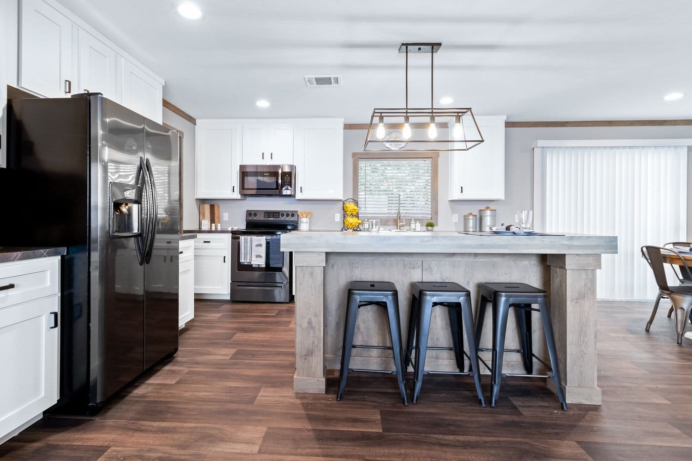 The FARMHOUSE 3 Kitchen. This Manufactured Mobile Home features 3 bedrooms and 2 baths.