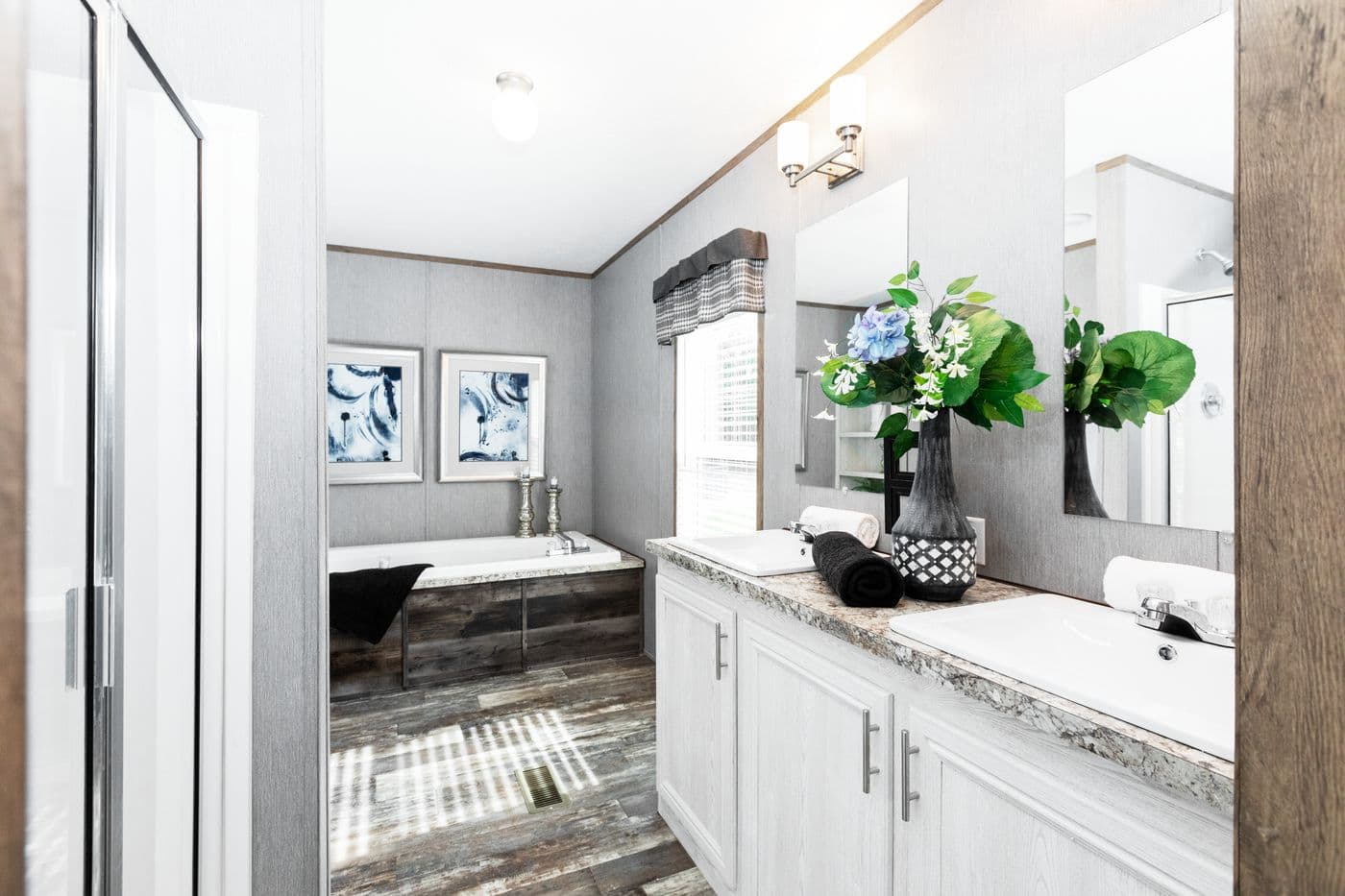 The THE MORRIS Primary Bathroom. This Manufactured Mobile Home features 3 bedrooms and 2 baths.