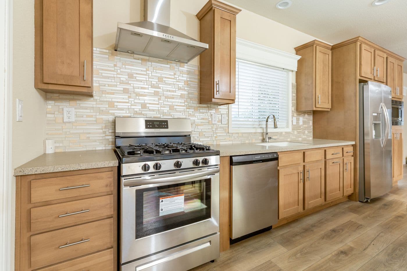The CORONADO 2452G Kitchen. This Manufactured Mobile Home features 3 bedrooms and 2 baths.