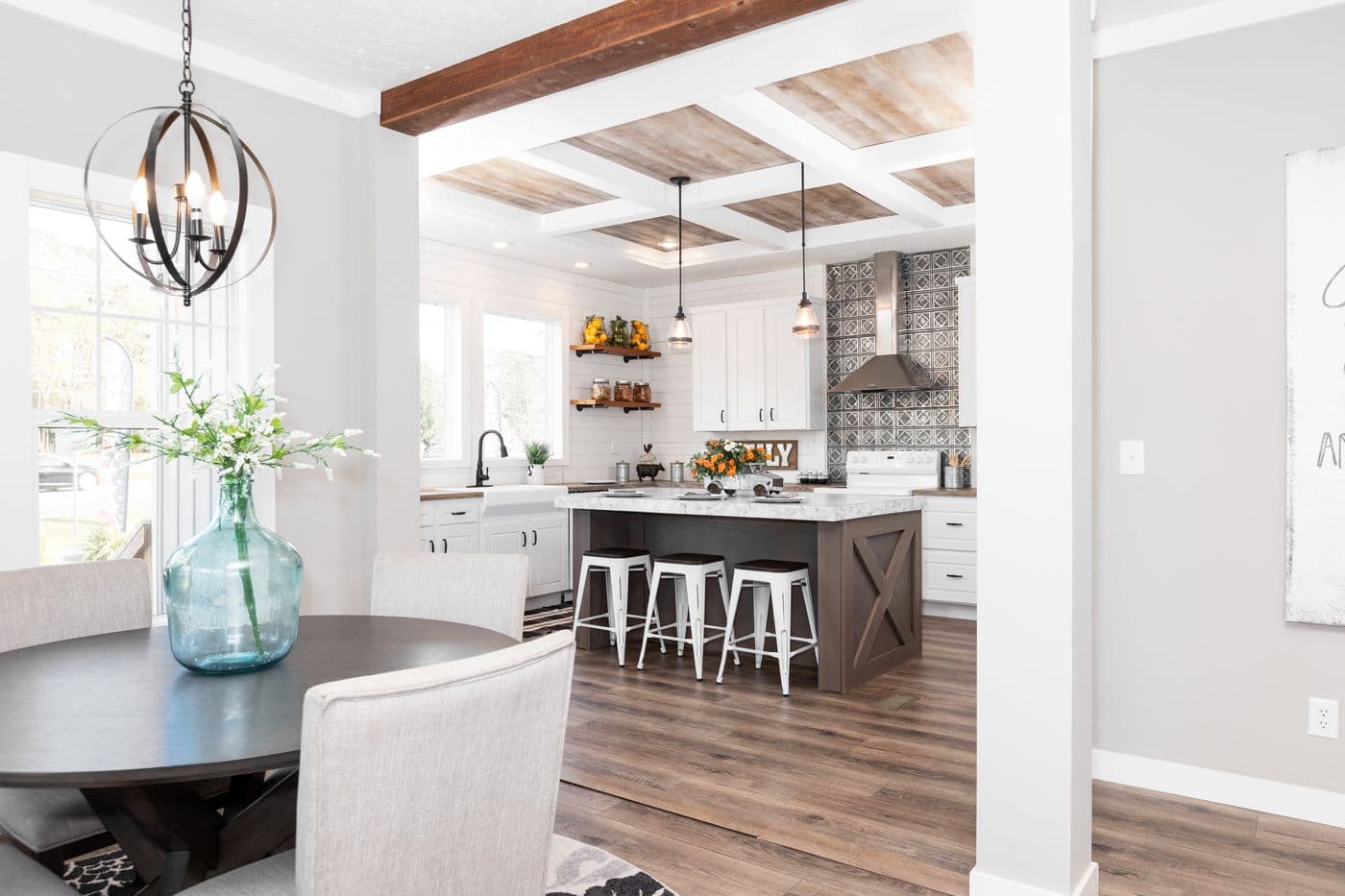 The 1440 CAROLINA 4BR BELLE Dining Area. This Manufactured Mobile Home features 4 bedrooms and 2 baths.