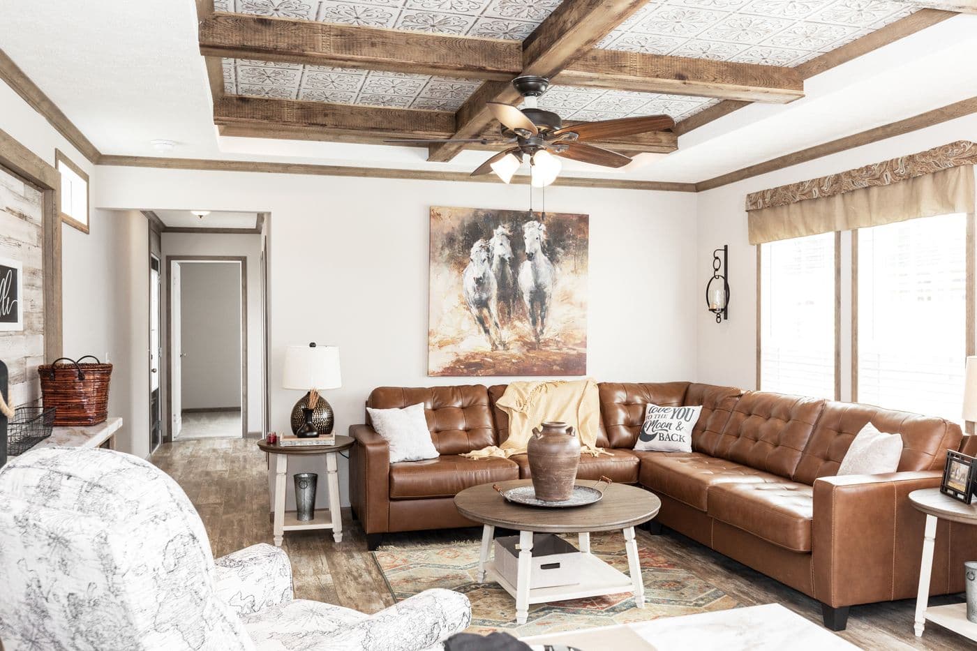 The THE MARION Living Room. This Manufactured Mobile Home features 3 bedrooms and 2 baths.