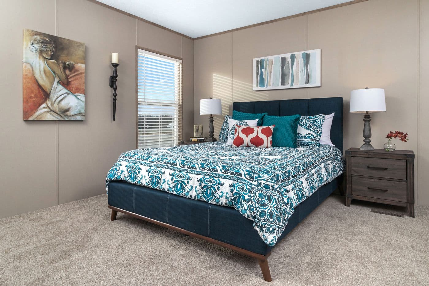 The FARMHOUSE FLEX Primary Bedroom. This Manufactured Mobile Home features 3 bedrooms and 2.5 baths.