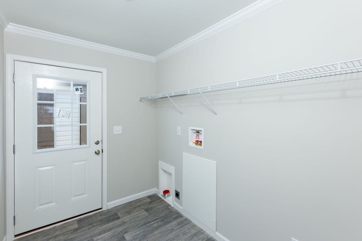 The THE FREEDOM BREEZE Utility Room. This Manufactured Mobile Home features 3 bedrooms and 2 baths.