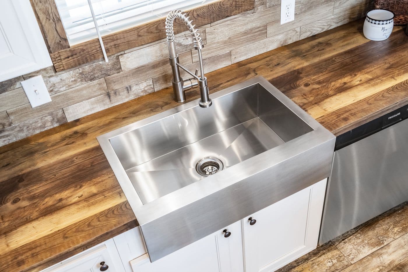 The THE BOBBY JO Kitchen. This Manufactured Mobile Home features 3 bedrooms and 2 baths.