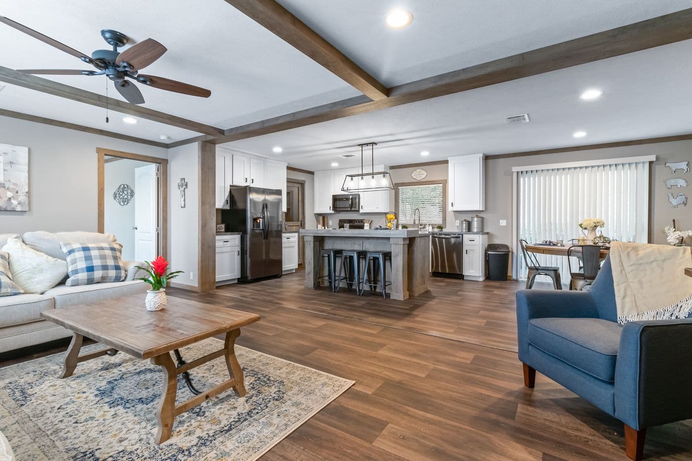 The FARMHOUSE 3 Living Room. This Manufactured Mobile Home features 3 bedrooms and 2 baths.