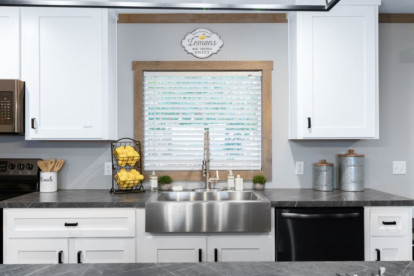 The FARMHOUSE 3 Kitchen. This Manufactured Mobile Home features 3 bedrooms and 2 baths.