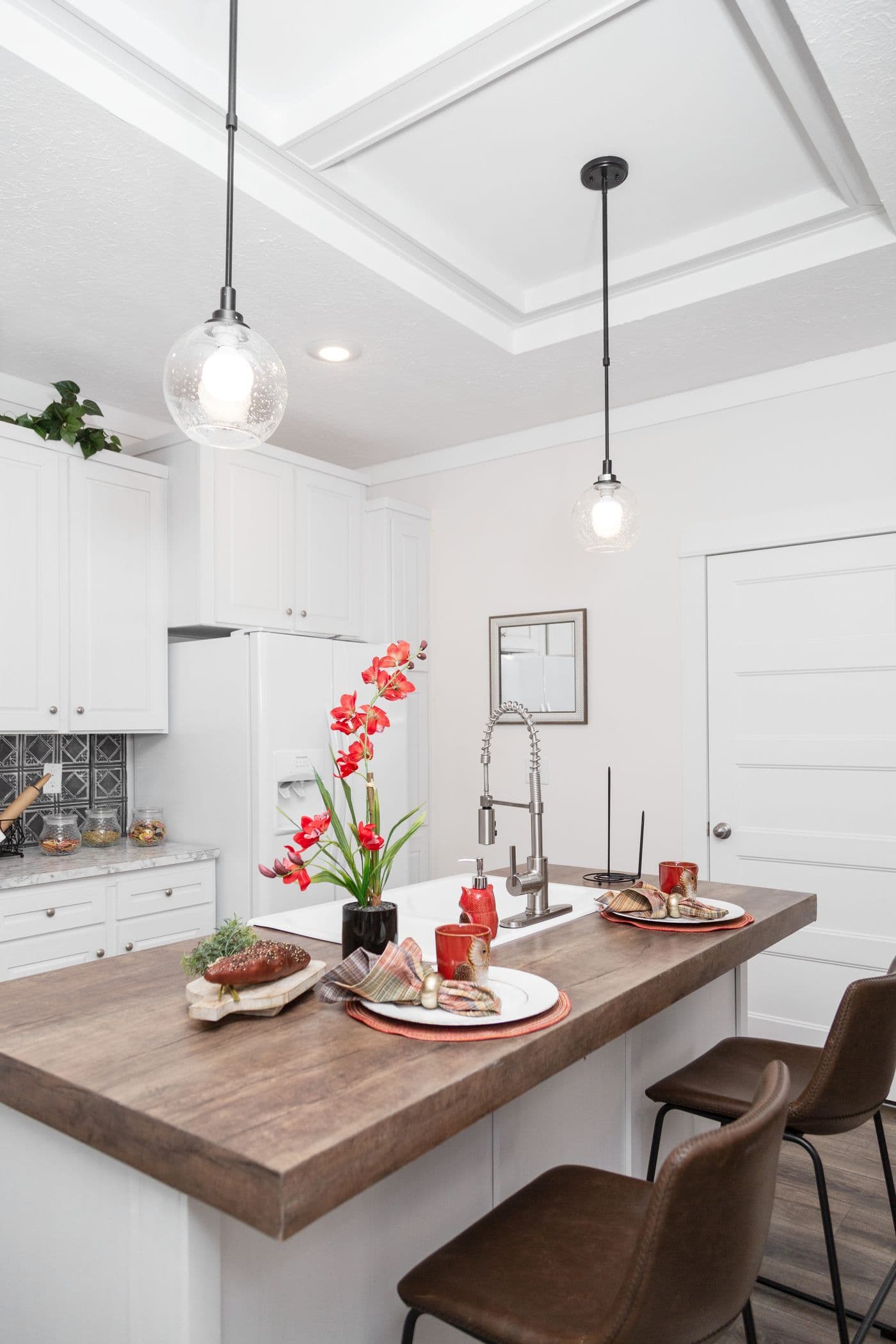 The 1439 CAROLINA "MAGNOLIA" Kitchen. This Manufactured Mobile Home features 3 bedrooms and 2 baths.