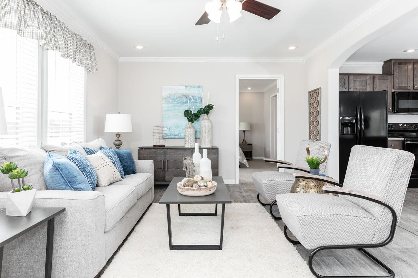 The THE VILLETTE Living Room. This Manufactured Mobile Home features 3 bedrooms and 2 baths.