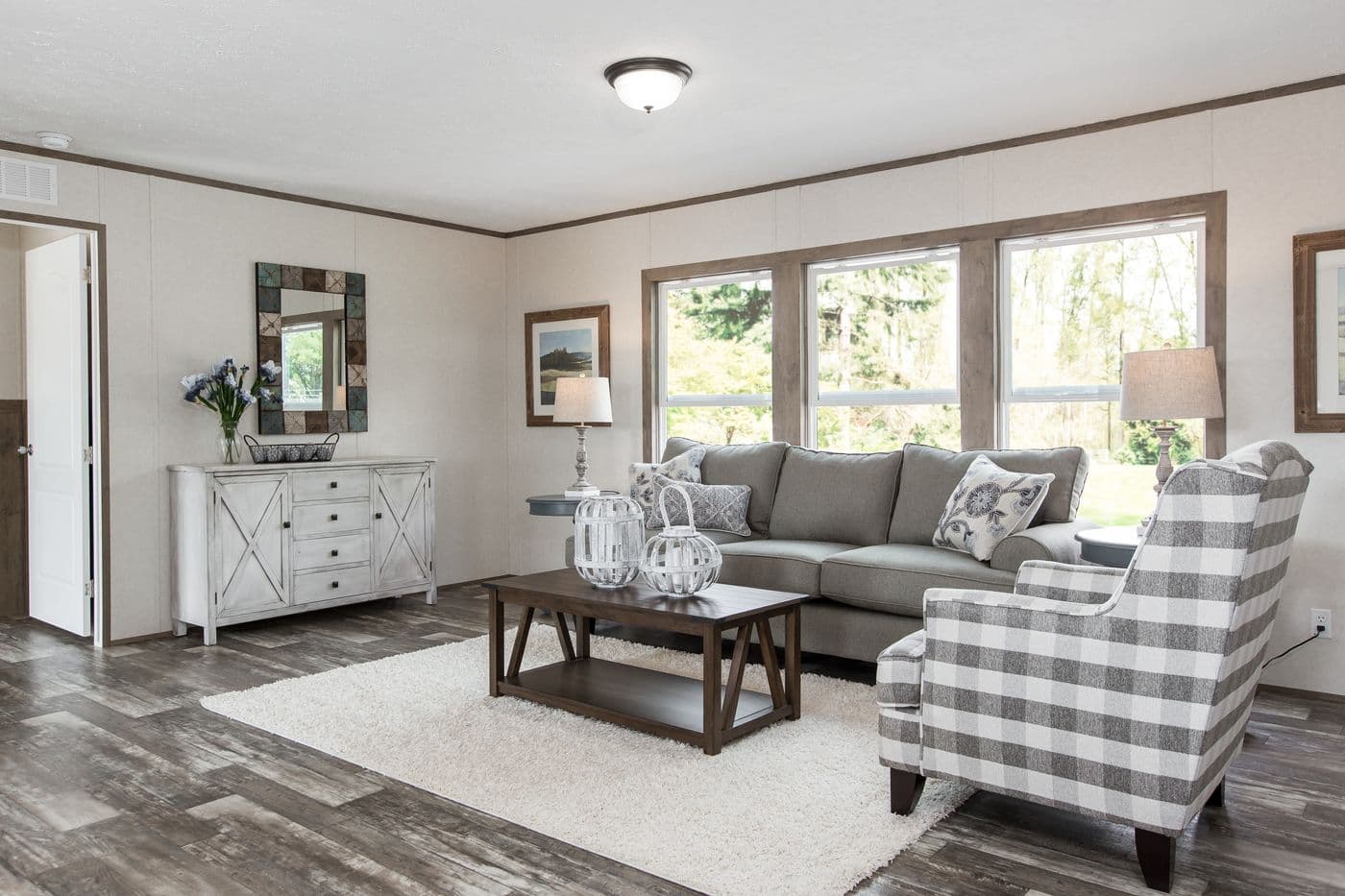 The THE BREEZE 2.5 Living Room. This Manufactured Mobile Home features 4 bedrooms and 2 baths.