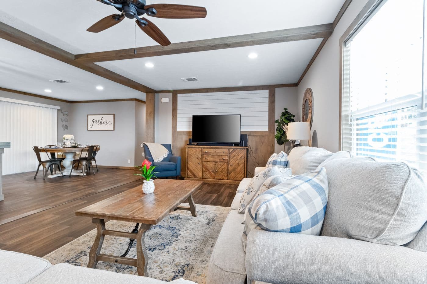 The FARMHOUSE 3 Living Room. This Manufactured Mobile Home features 3 bedrooms and 2 baths.