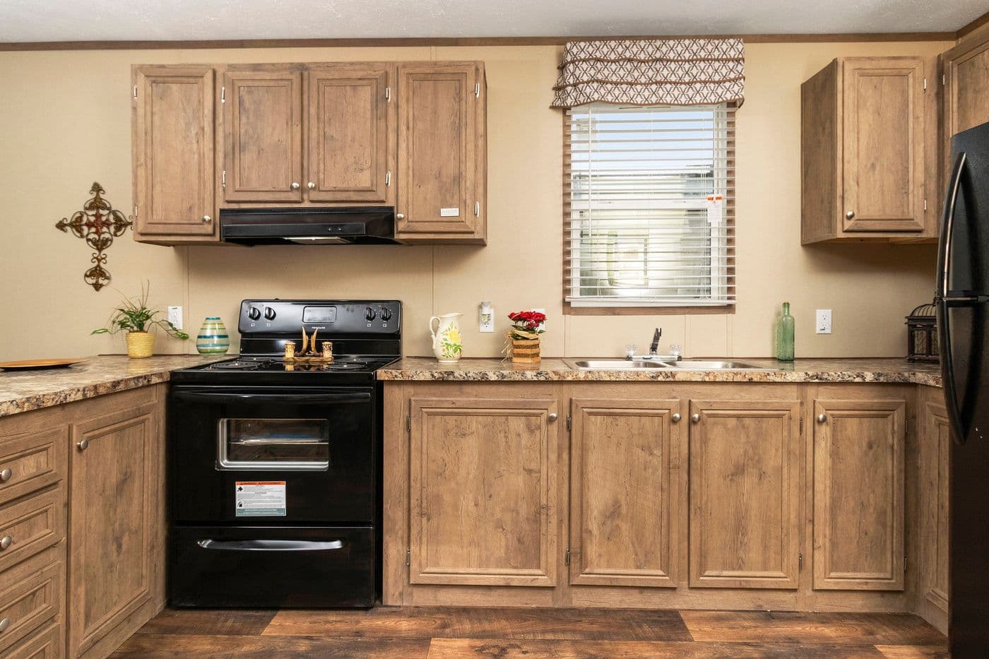 The THE HANCOCK Kitchen. This Manufactured Mobile Home features 2 bedrooms and 2 baths.