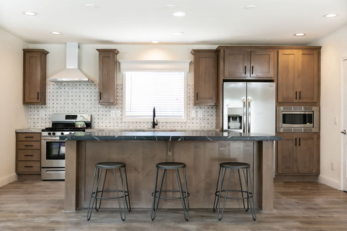 The CORONADO 2462A Kitchen. This Manufactured Mobile Home features 3 bedrooms and 2 baths.