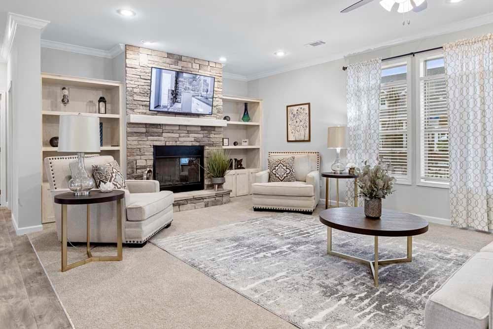 The THE TILLEY Living Room. This Manufactured Mobile Home features 3 bedrooms and 2 baths.