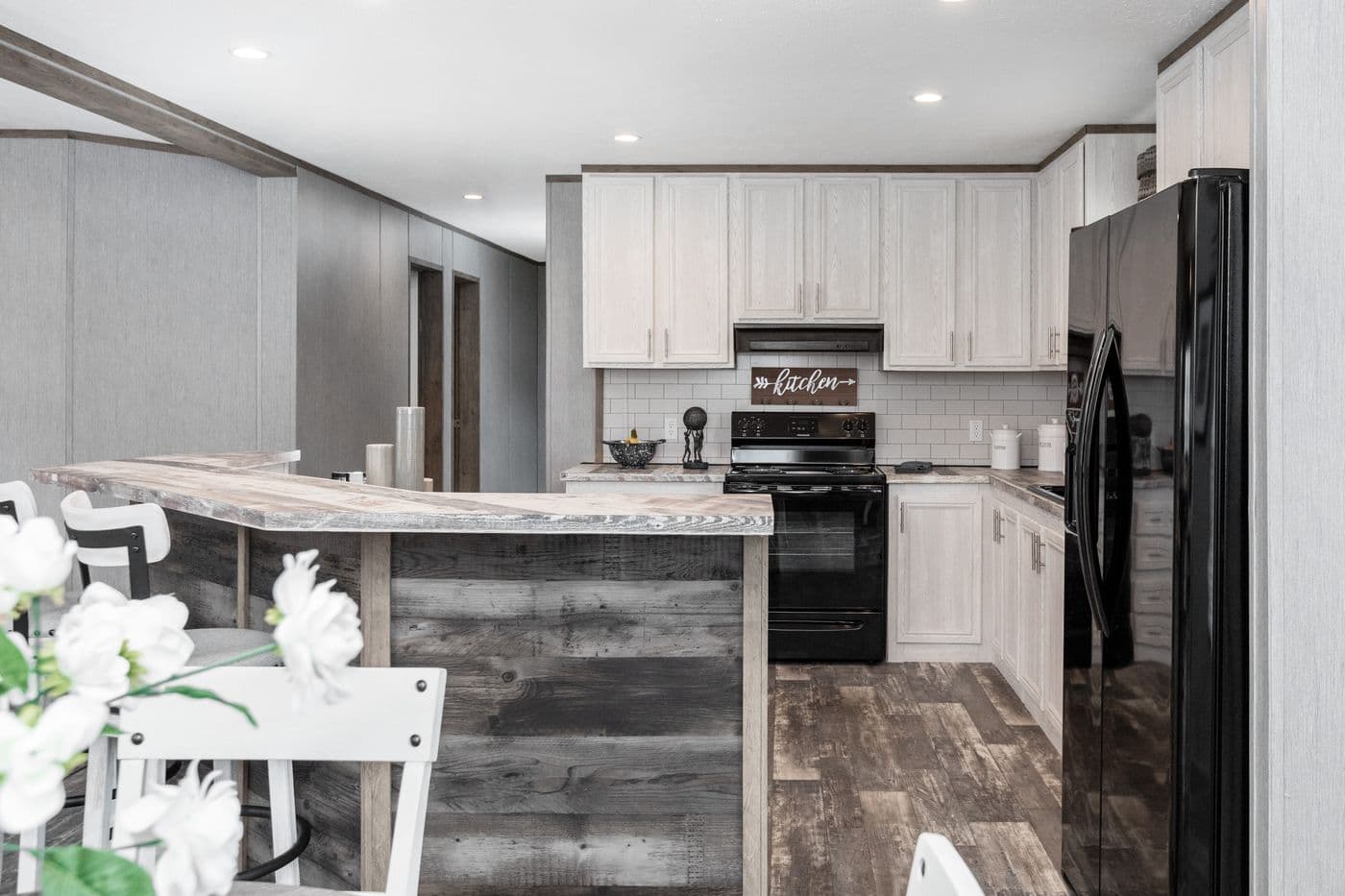 The THE MORRIS Kitchen. This Manufactured Mobile Home features 3 bedrooms and 2 baths.