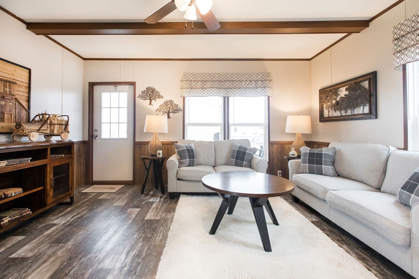 The THE LODGE Living Room. This Manufactured Mobile Home features 2 bedrooms and 2 baths.