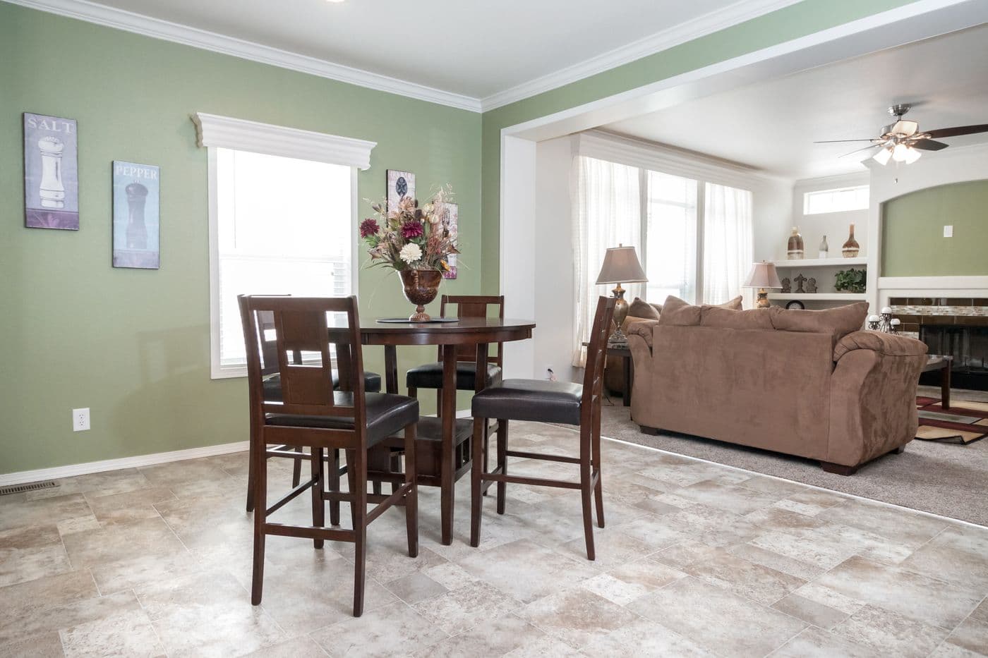 The K3068C Dining Area. This Manufactured Mobile Home features 3 bedrooms and 2 baths.