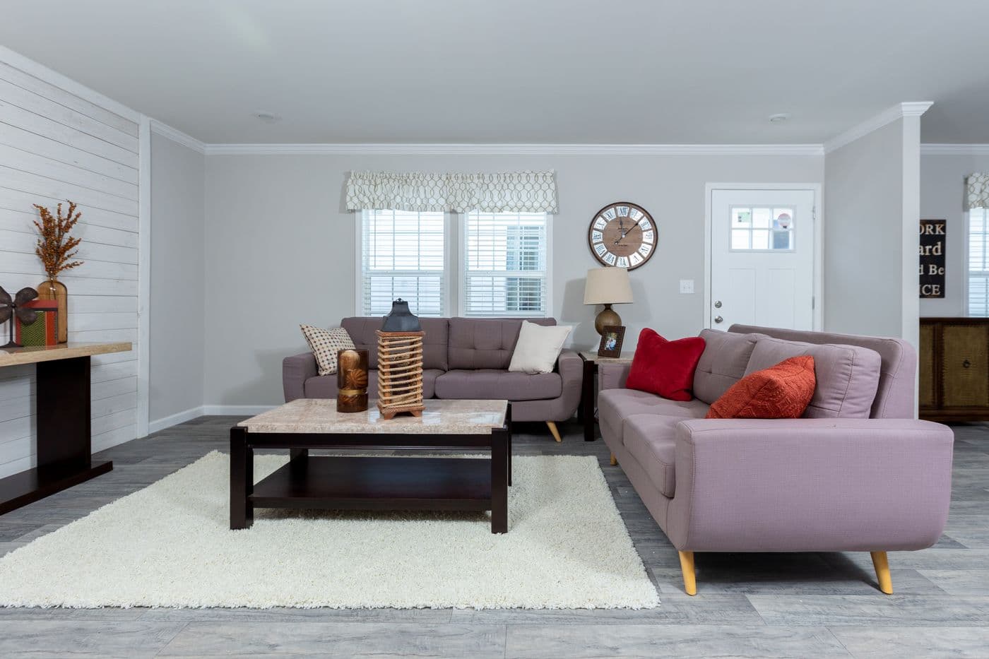 The THE FREEDOM BREEZE Living Room. This Manufactured Mobile Home features 3 bedrooms and 2 baths.