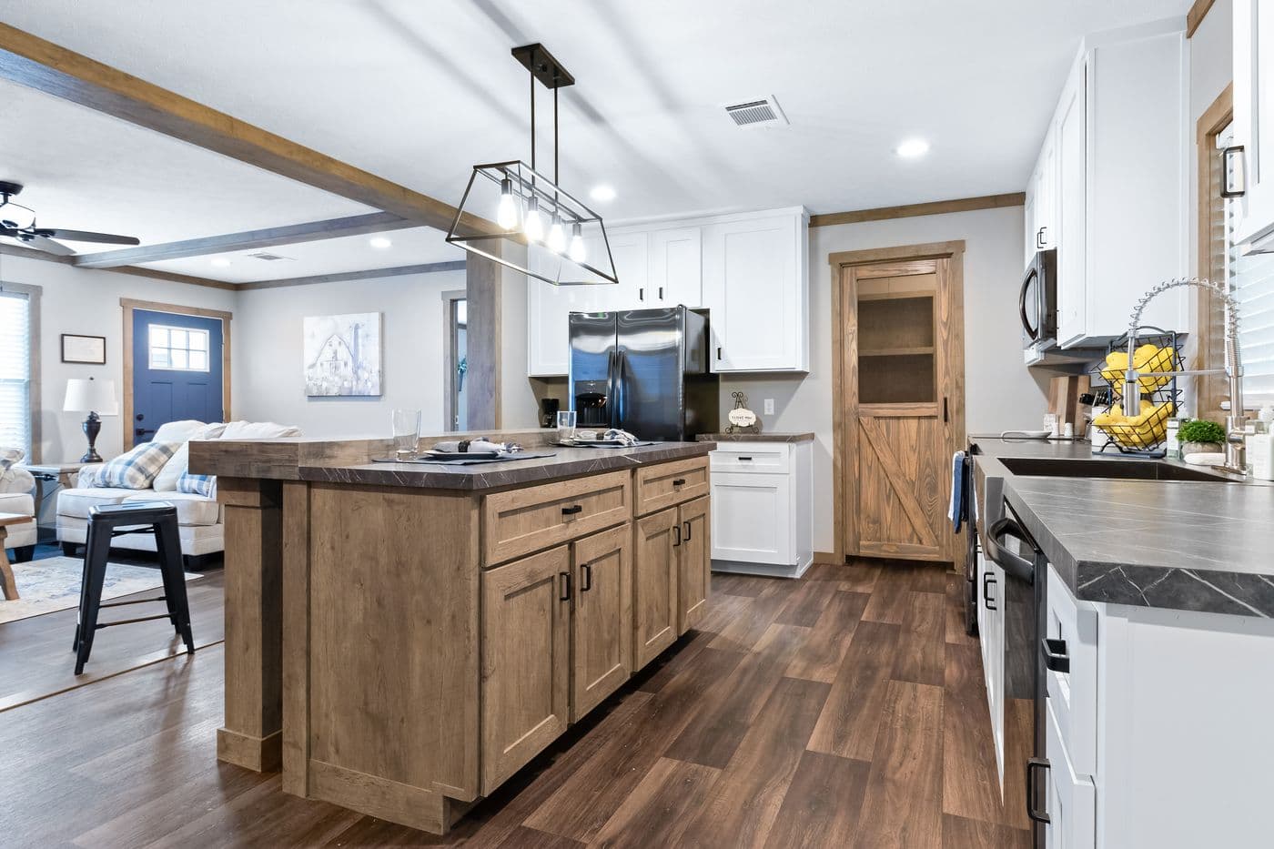 The FARMHOUSE 3 Kitchen. This Manufactured Mobile Home features 3 bedrooms and 2 baths.