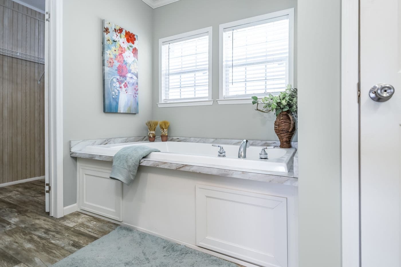 The THE INGRAM Primary Bathroom. This Manufactured Mobile Home features 3 bedrooms and 2 baths.