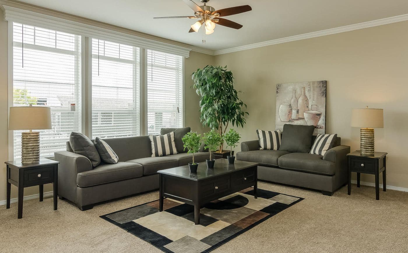 The TRANQUILITY TR3062A Living Room. This Manufactured Mobile Home features 3 bedrooms and 2 baths.
