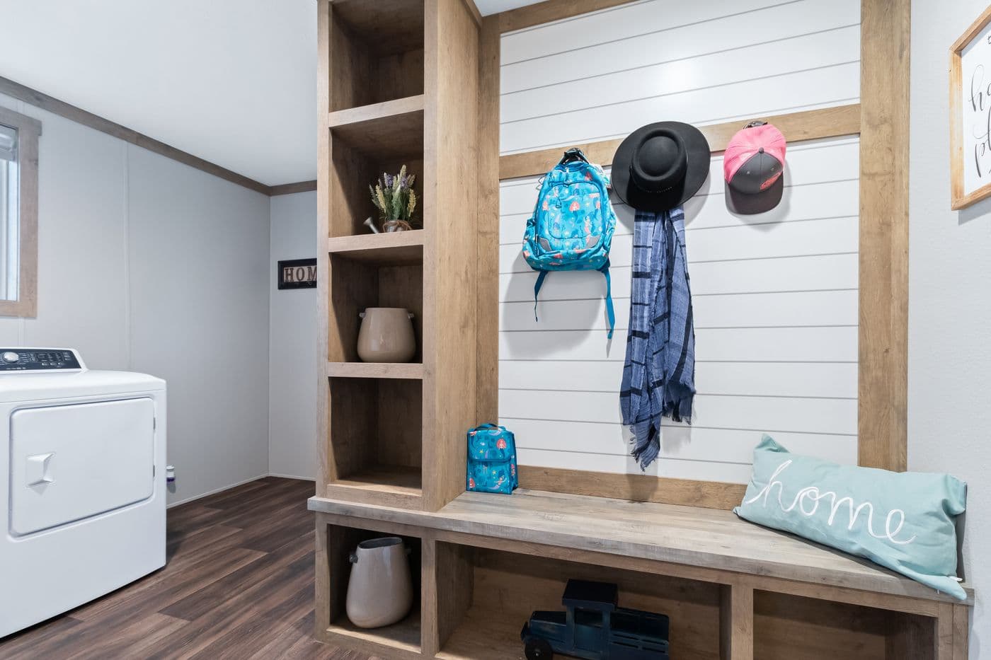 The FARMHOUSE 3 Utility Room. This Manufactured Mobile Home features 3 bedrooms and 2 baths.