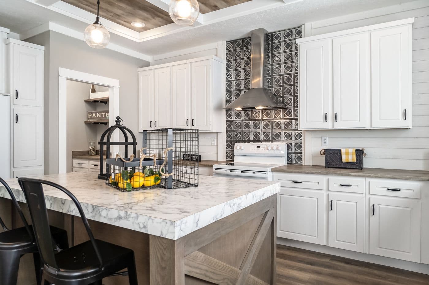 The 1434 CAROLINA "SOUTHERN BELLE" Kitchen. This Manufactured Mobile Home features 3 bedrooms and 2 baths.