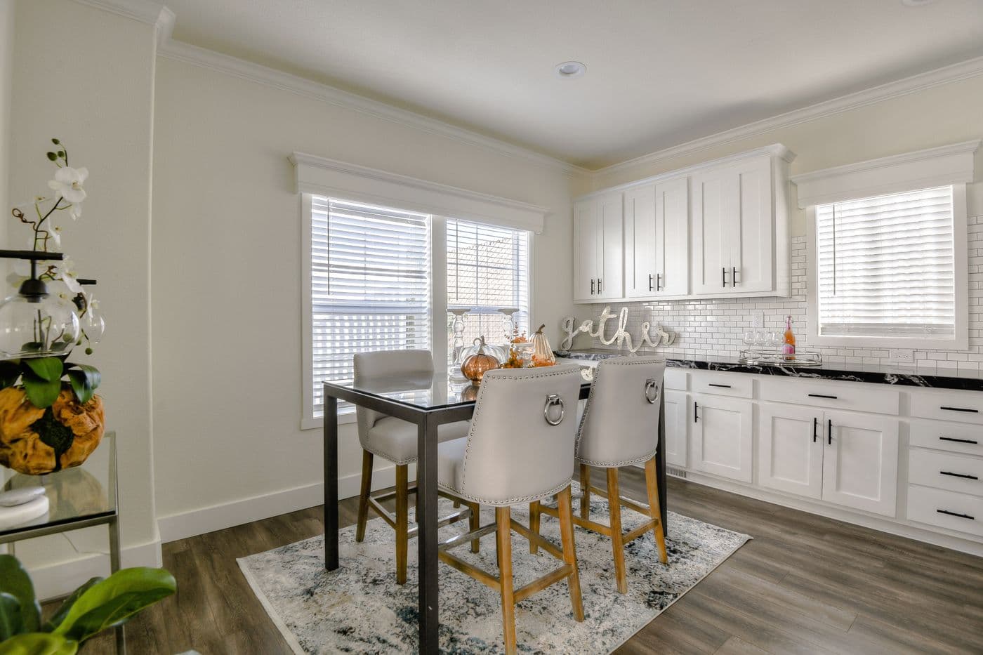 The CORONADO 2458F Dining Area. This Manufactured Mobile Home features 3 bedrooms and 3 baths.
