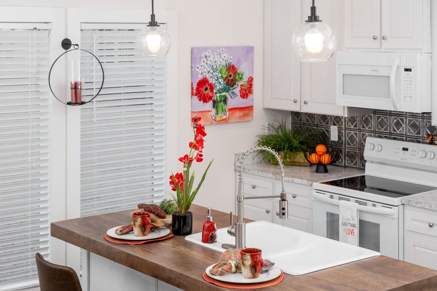 The 1439 CAROLINA "MAGNOLIA" Kitchen. This Manufactured Mobile Home features 3 bedrooms and 2 baths.