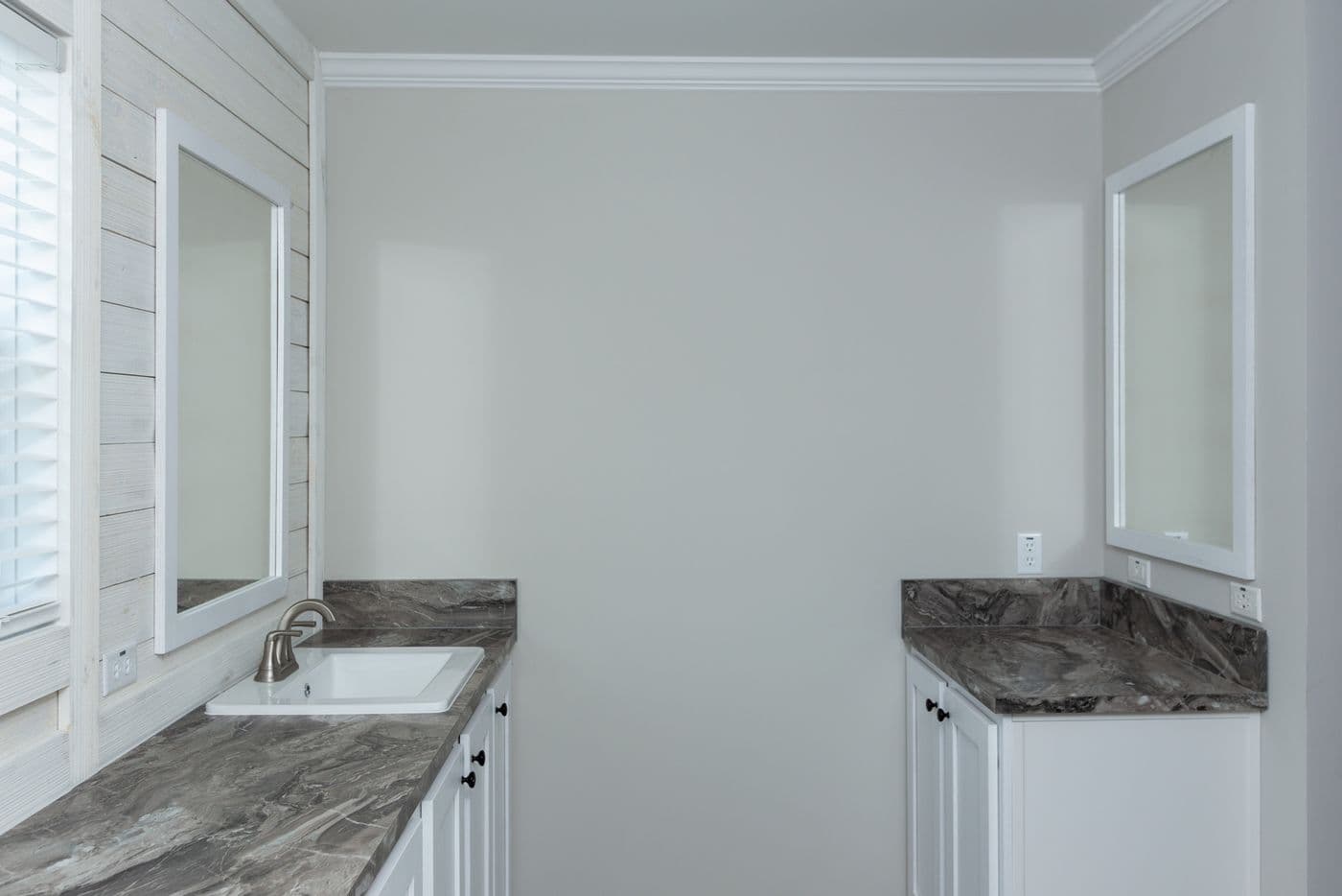 The THE FREEDOM BREEZE Primary Bathroom. This Manufactured Mobile Home features 3 bedrooms and 2 baths.