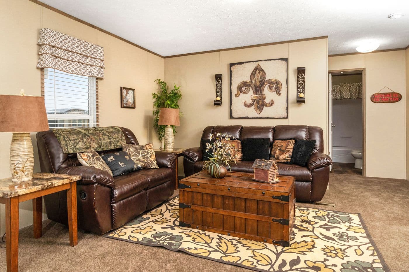 The THE HANCOCK Living Room. This Manufactured Mobile Home features 2 bedrooms and 2 baths.