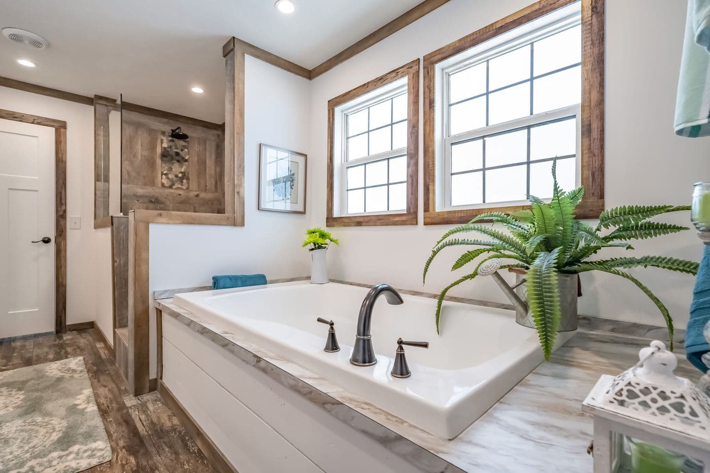 The THE EMMA JEAN Primary Bathroom. This Manufactured Mobile Home features 4 bedrooms and 3 baths.