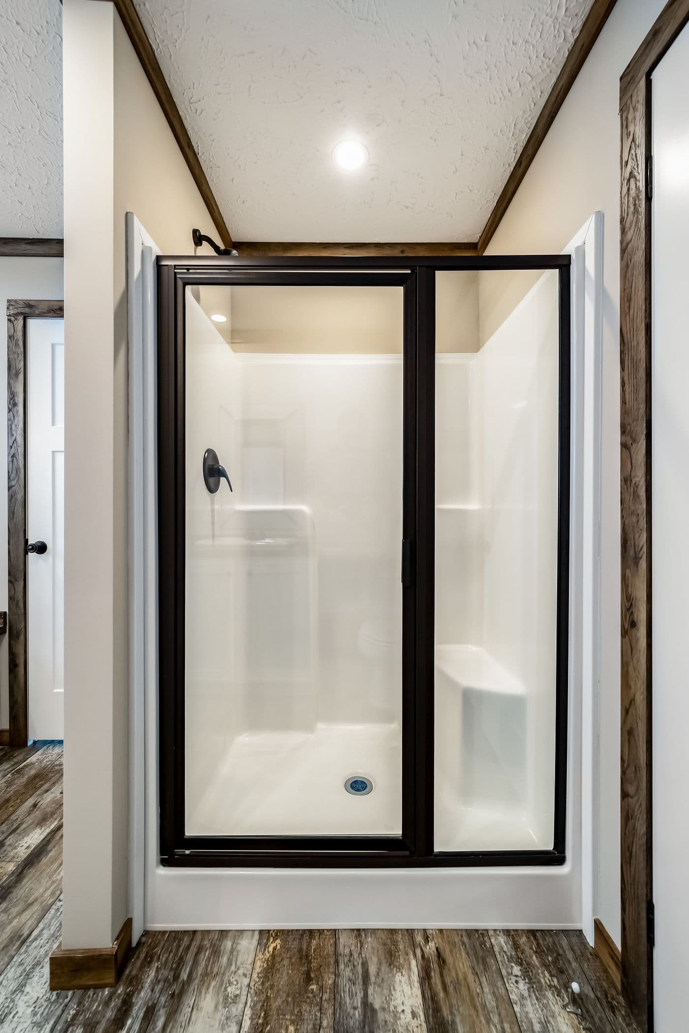 The THE BOBBY JO Primary Bathroom. This Manufactured Mobile Home features 3 bedrooms and 2 baths.