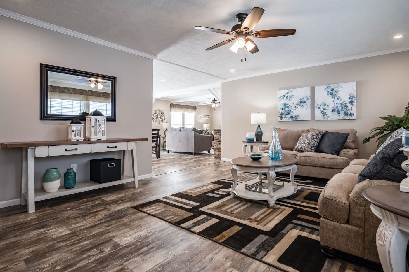 The THE RODDY Living Room. This Manufactured Mobile Home features 4 bedrooms and 3 baths.