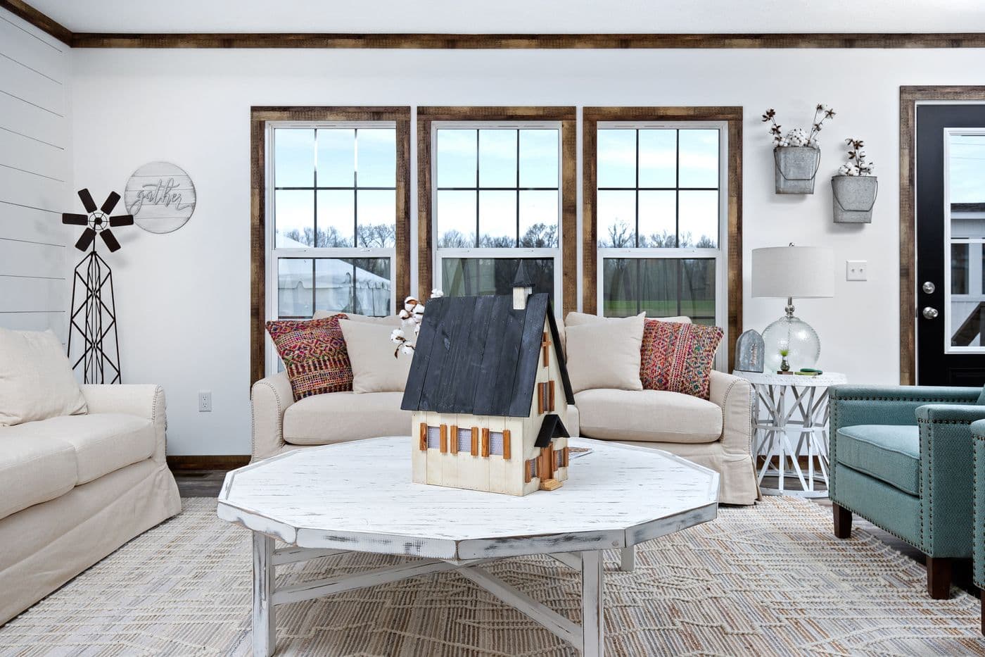 The THE LIZA JANE Living Room. This Manufactured Mobile Home features 3 bedrooms and 2 baths.