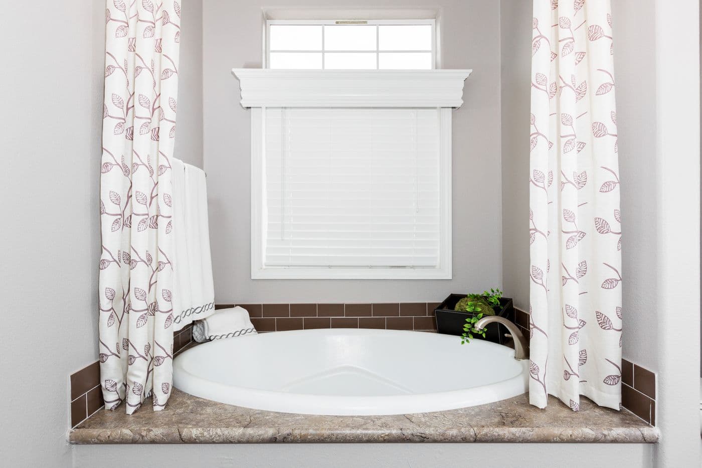 The ENCHANTMENT 3070A Guest Bathroom. This Manufactured Mobile Home features 3 bedrooms and 2 baths.