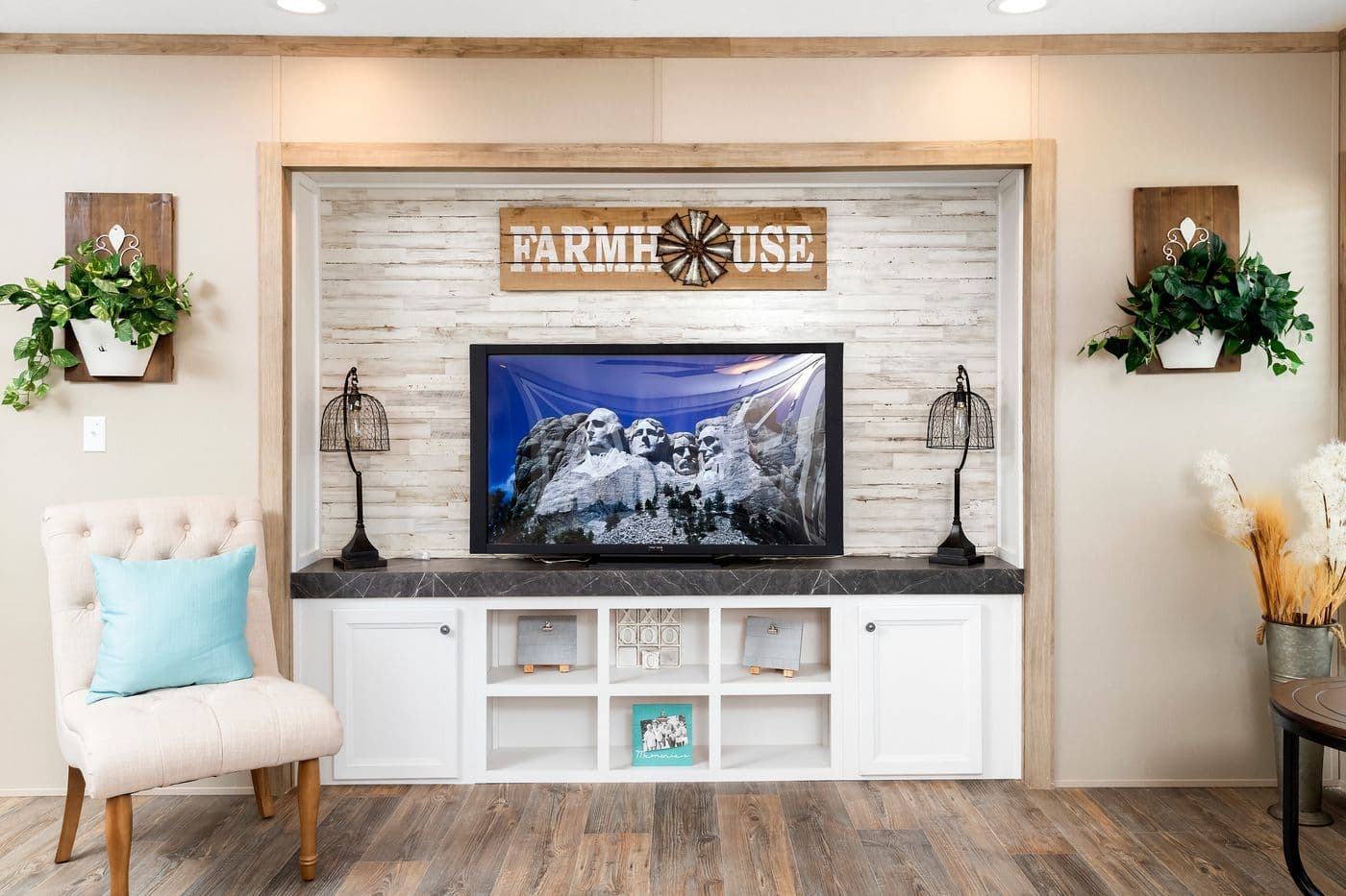 The FARMHOUSE FLEX Living Room. This Manufactured Mobile Home features 3 bedrooms and 2.5 baths.