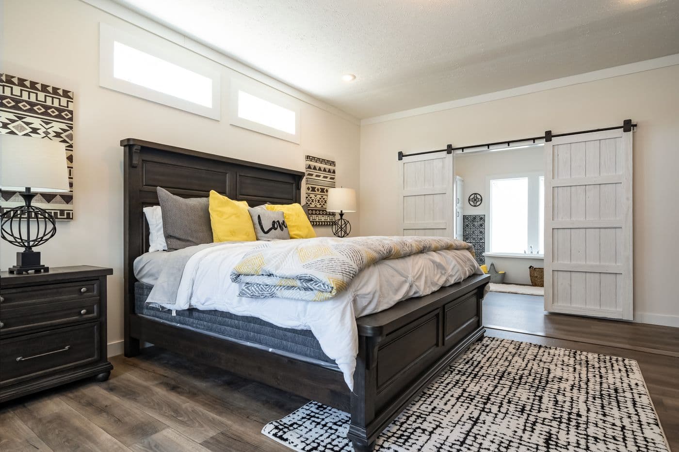 The 1434 CAROLINA "SOUTHERN BELLE" Primary Bedroom. This Manufactured Mobile Home features 3 bedrooms and 2 baths.