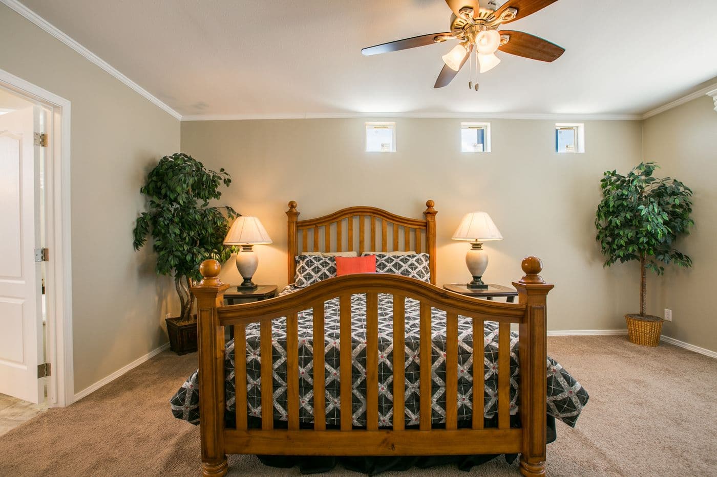 The TRANQUILITY TR3062A Primary Bedroom. This Manufactured Mobile Home features 3 bedrooms and 2 baths.