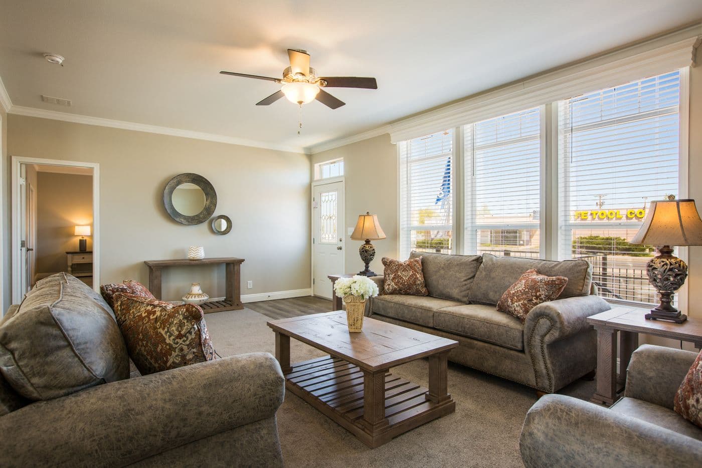 The EDGEWOOD Living Room. This Manufactured Mobile Home features 3 bedrooms and 2 baths.