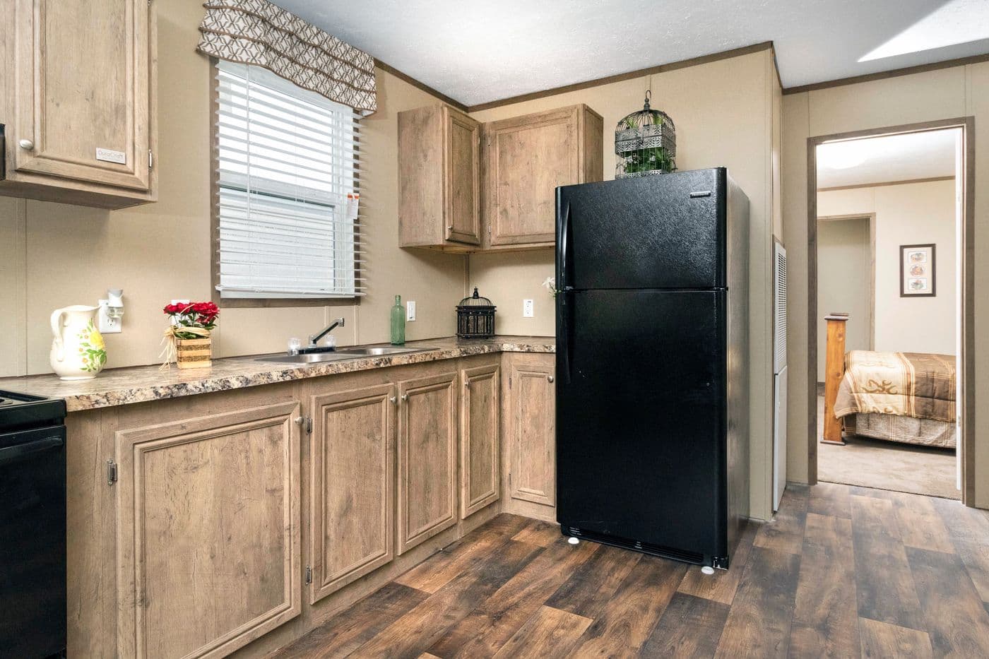 The THE HANCOCK Kitchen. This Manufactured Mobile Home features 2 bedrooms and 2 baths.