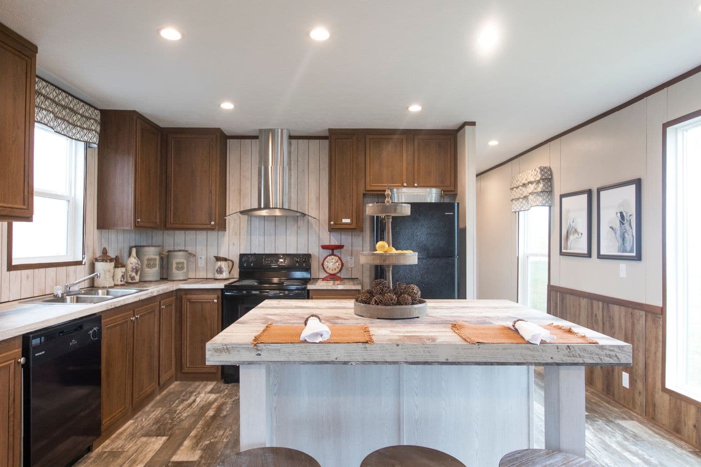 The THE LODGE Kitchen. This Manufactured Mobile Home features 2 bedrooms and 2 baths.