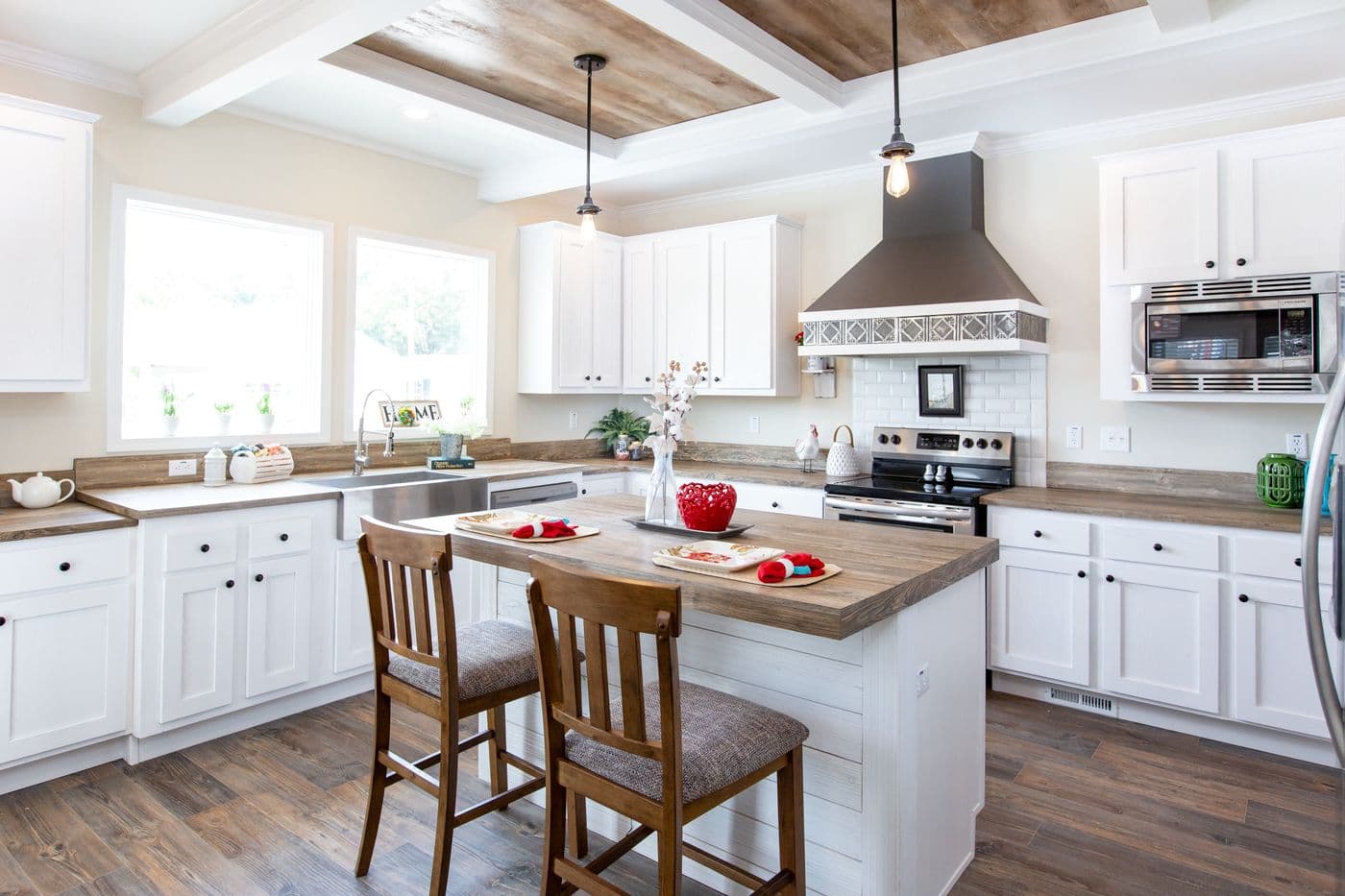 The SOUTHERN CHARM Kitchen. This Manufactured Mobile Home features 3 bedrooms and 2 baths.