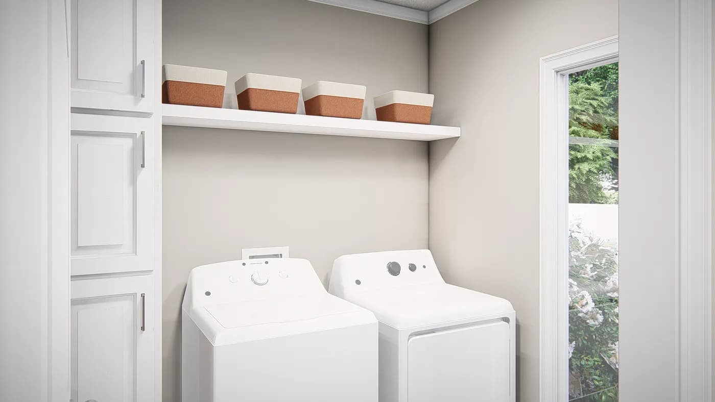 The THE VALHALLA Utility Room. This Manufactured Mobile Home features 3 bedrooms and 2 baths.