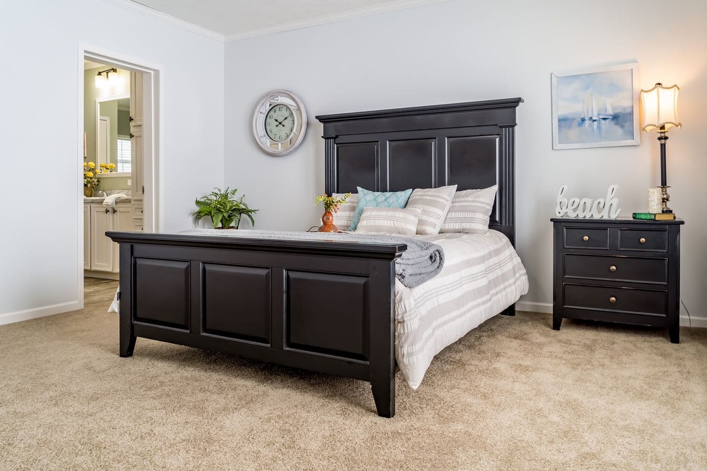 The THE INGRAM Guest Bedroom. This Manufactured Mobile Home features 3 bedrooms and 2 baths.