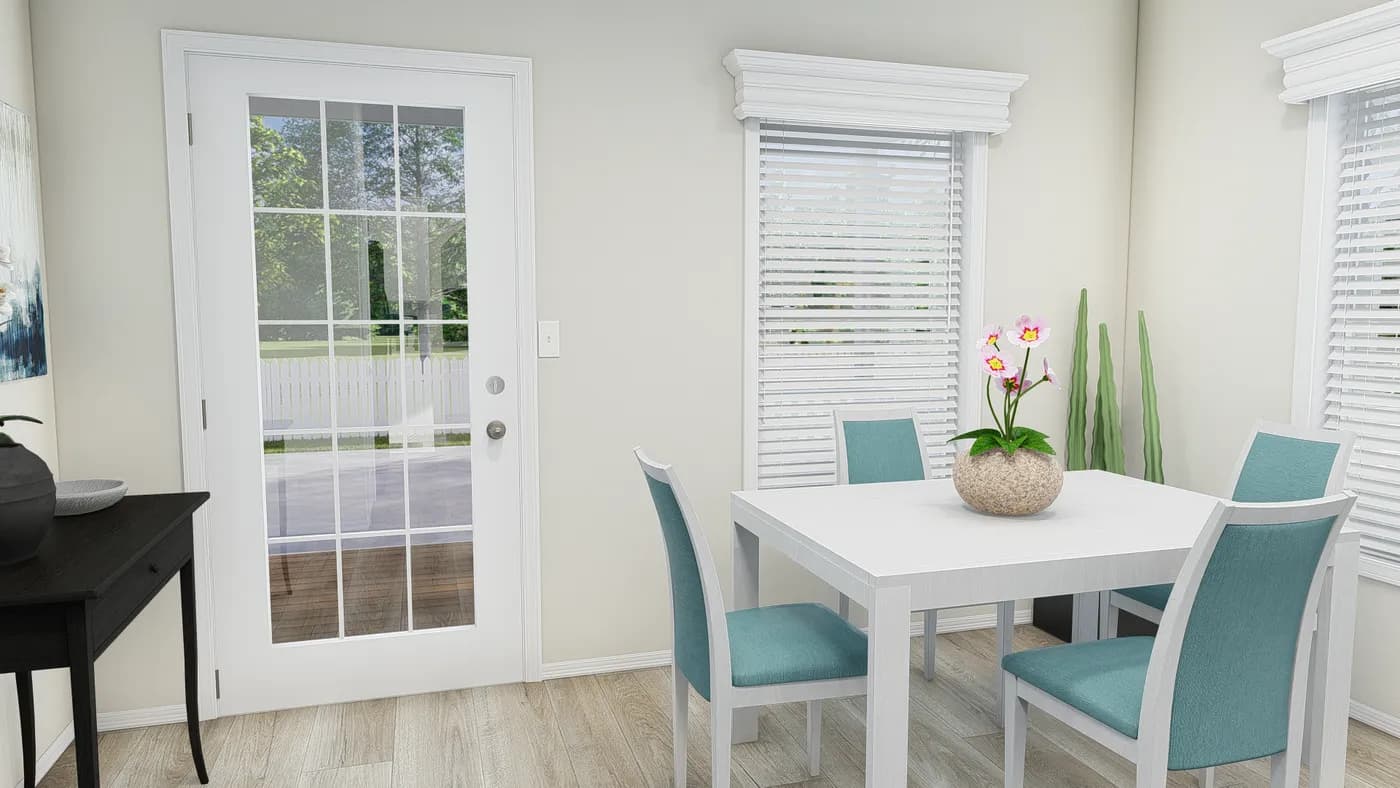 The K2750A Dining Area. This Manufactured Mobile Home features 3 bedrooms and 2 baths.