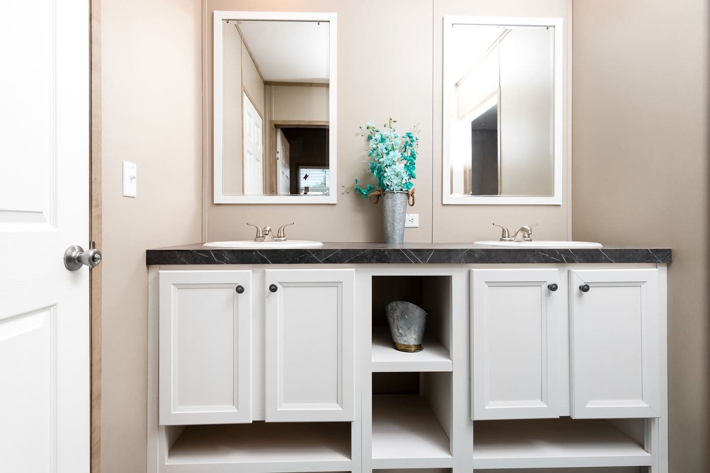 The FARMHOUSE FLEX Primary Bathroom. This Manufactured Mobile Home features 3 bedrooms and 2.5 baths.