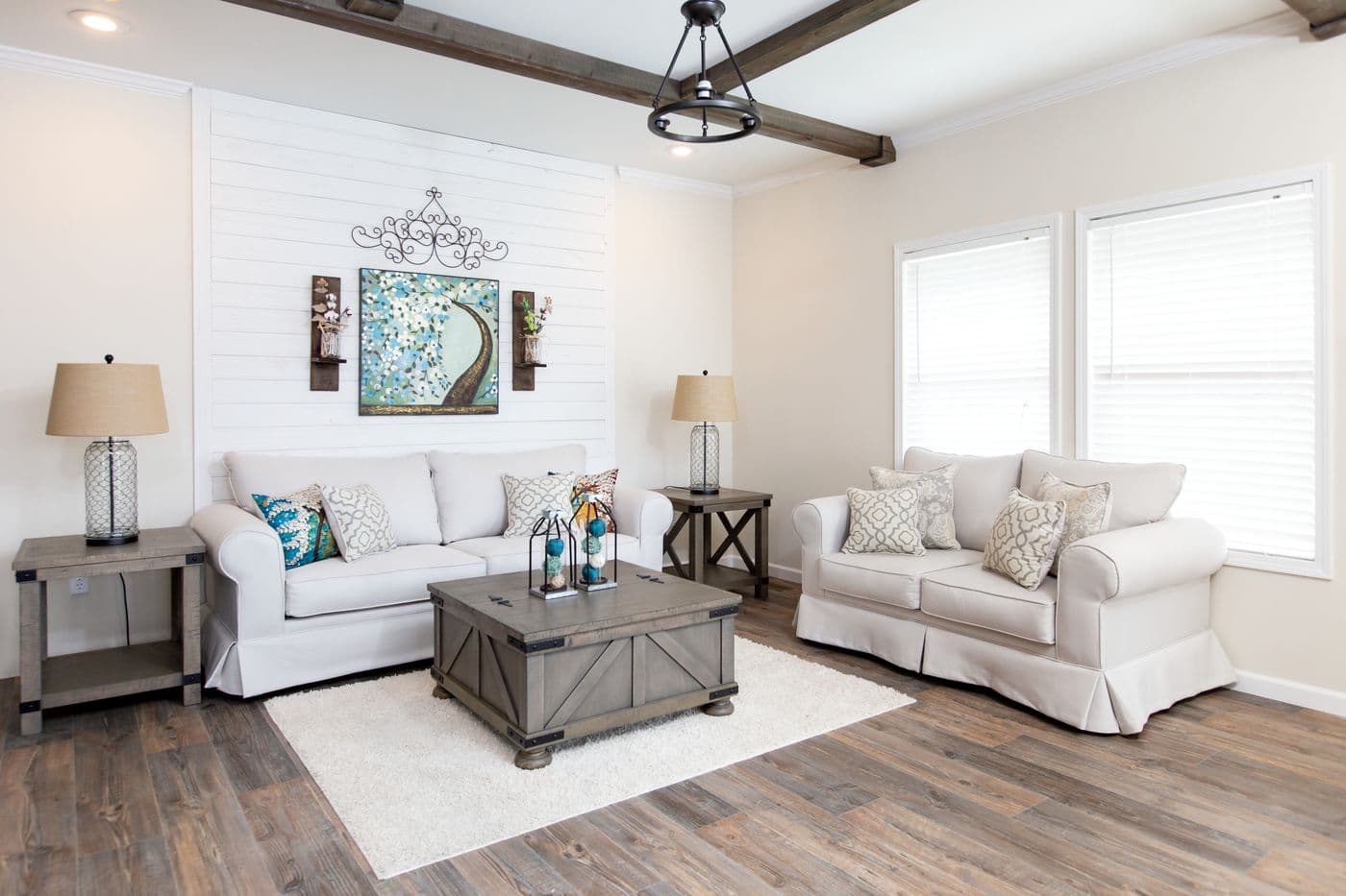 The SOUTHERN CHARM Living Room. This Manufactured Mobile Home features 3 bedrooms and 2 baths.